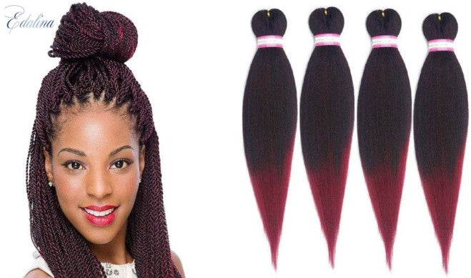 A bottle of Edalina hair growth oil placed next to a high-quality human hair body wave bundle and a matching lace closure, displayed on a clean aesthetic background.